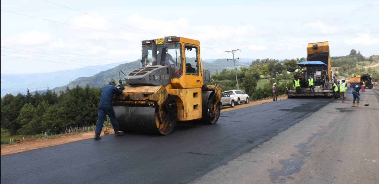 File image of workers repairing a road.
